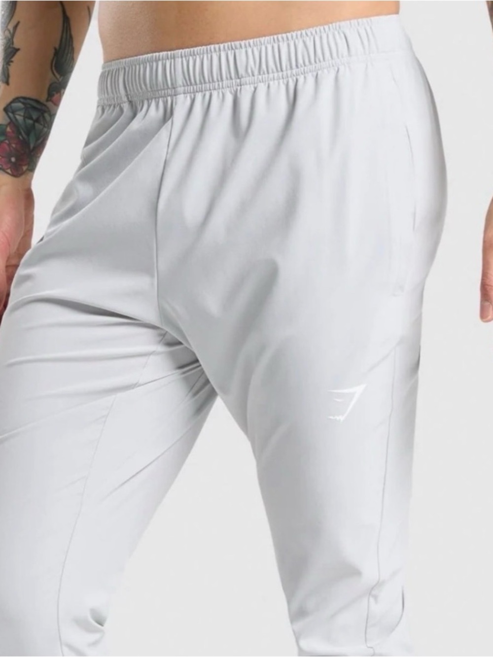 EUC Men’s GymShark Arrival Woven Joggers zipper bottom light gray small